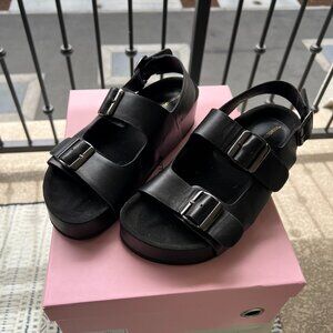 Intentionally Blank black leather platform sandals